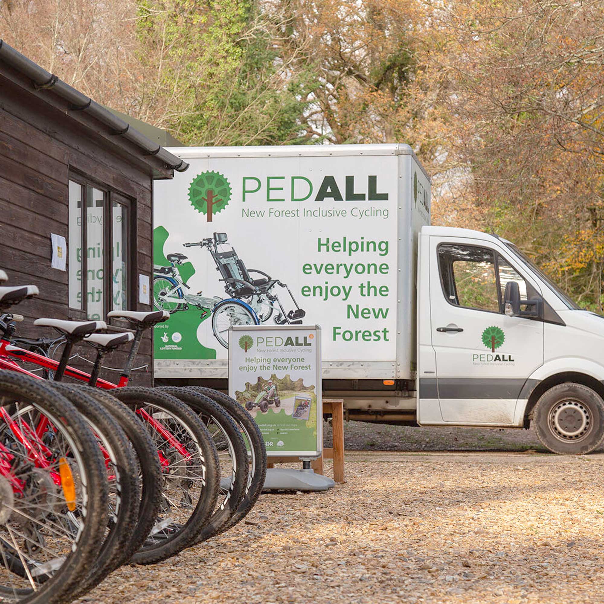 PEDALL van parked outside the Burley base with signage and bikes displayed